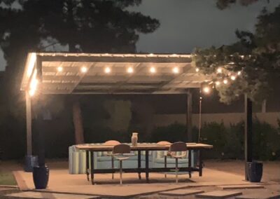 Custom shade structure at night, designed and created by Arizona Shade Company