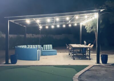 Custom shade structure at night, designed and created by Arizona Shade Company