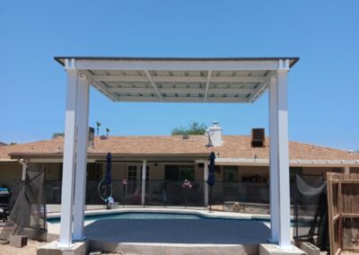 Custom shade cover for a swimming pool designed and made by Arizona Shade Company