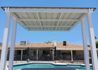 Custom shade cover for a swimming pool designed and made by Arizona Shade Company